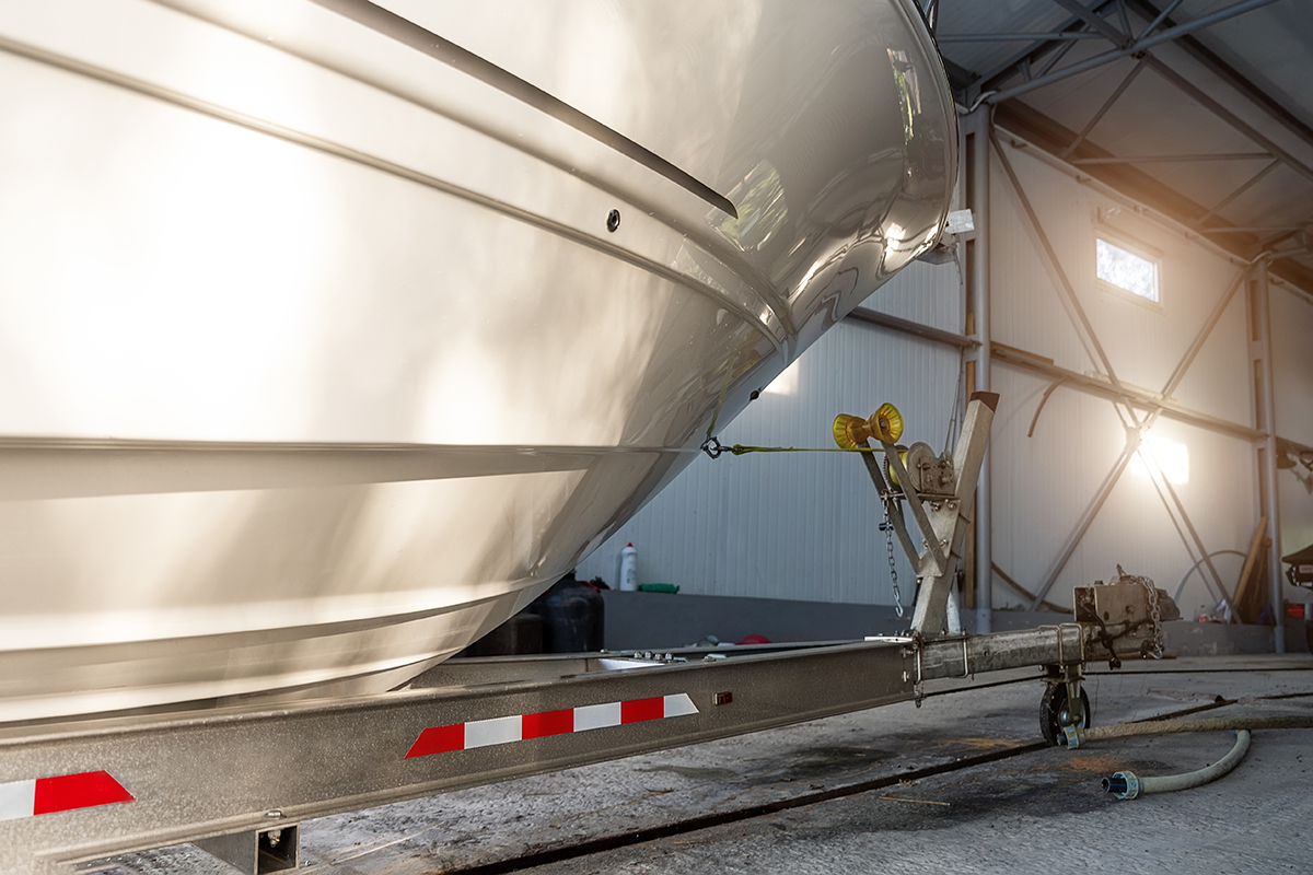 Boat stored in warehouse.