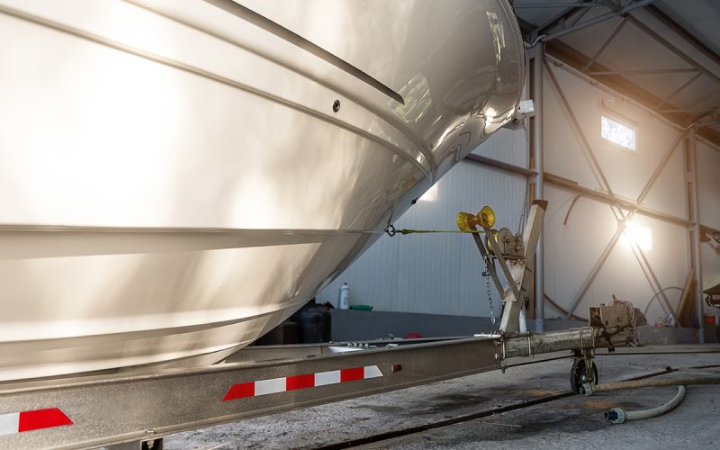 Boat stored in warehouse.